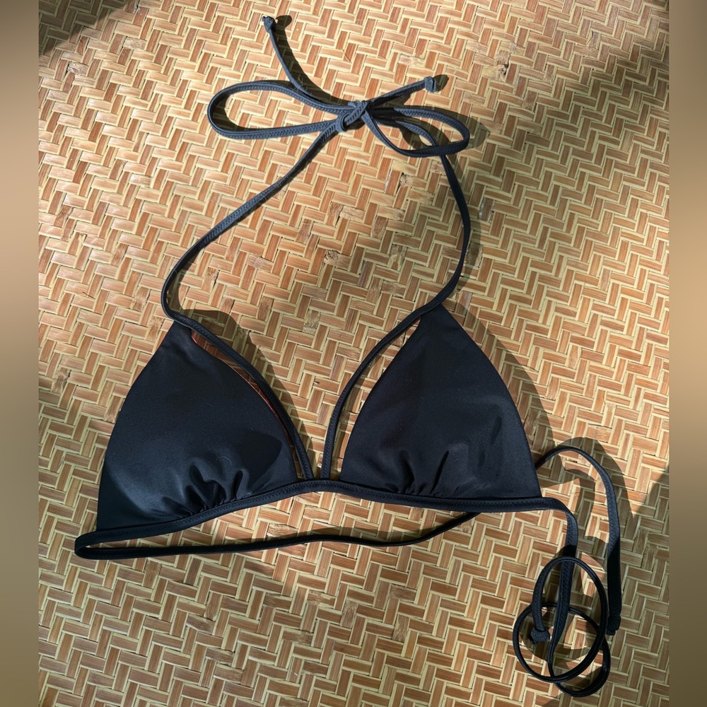 Super cute, strappy bikini top. Reversible and perfect for the pool.
